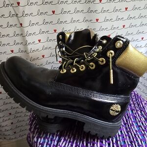 Timberland Women's Black and Gold Combat Boots